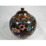 A good quality bulbous lidded pot on tri