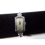 A lady's white metal Art Deco wristwatch