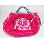 A lady's pink velour handbag, fully line