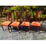 Four early 20th century mahogany dining