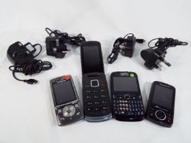 Four mobile phones to include a Motorola