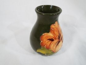 Moorcroft Pottery - a small bulbous vase