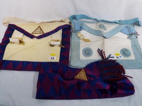 Two Freemasons aprons and sash and an ho