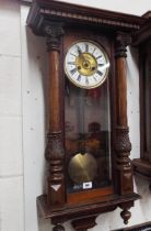 A Vienna style wall clock in a walnut ca