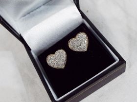 A pair of 9 carat gold stud earrings set