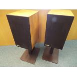 A pair of Arcam One speakers on stands serial No.