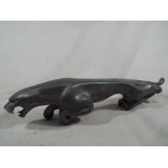 Automobilia - a Jaguar car mascot taken from the factory prior to chroming
