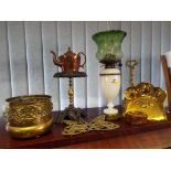 A Victorian oil lamp with funnel and green glass diffuser and a quantity of period copper and
