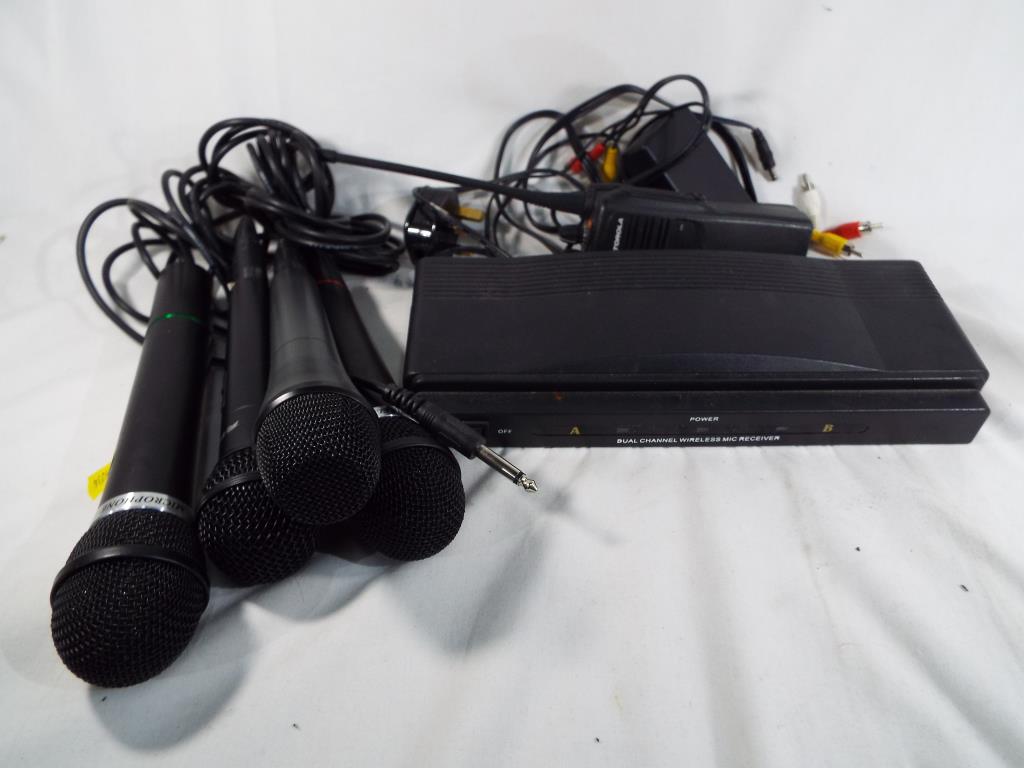 A dual channel wireless mike receiver, two dynamic wireless microphones,