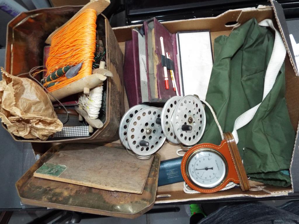 Angling - a collection of vintage fishing equipment and accessories to include floats, lines, hooks,