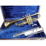 An Elrharl brass trumpet distributed by Vincent Bach International Ltd with a white metal