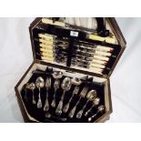 A good quality oak cased canteen of plated cutlery comprising approximately 58 pieces
