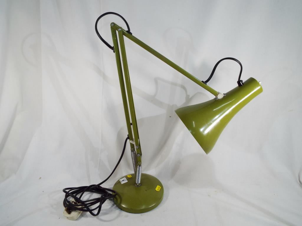 A vintage poise lamp