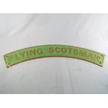 A cast iron wall plaque entitled 'Flying Scotsman'.
