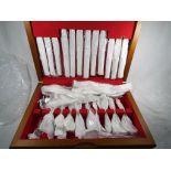 A modern cased canteen of cutlery,