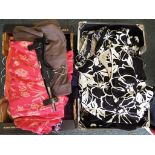 Two boxes containing a large collection of lady's clothing to include skirts, dresses and blouses,
