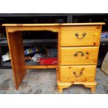 A pine three drawer dressing table, 75cm x 95cm x 42.