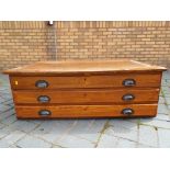 An early 20th century oak map / plan chest of three long drawers, 40 cm (h) x 120 cm (w) x 87.