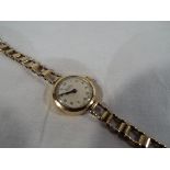 9ct gold - a 9ct gold Bentima Star lady's wristwatch with 9ct gold strap, approx weight 12.