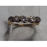 A lady’s 9ct gold and five diamond ring, approx. weight 1.6 grams, size O ½, boxed. Est. £60 - £80.