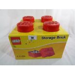 Lego - a storage brick 4 knobs Lego container, unused with original packaging.