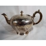 A Victorian hallmarked silver teapot with decorative etching, London assay 1840,