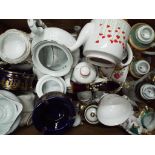A good mixed lot of ceramics to include teapots, vases,
