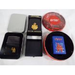 Three Zippo lighters