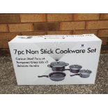 A seven-piece non stick cookware set with carbon steel pans,