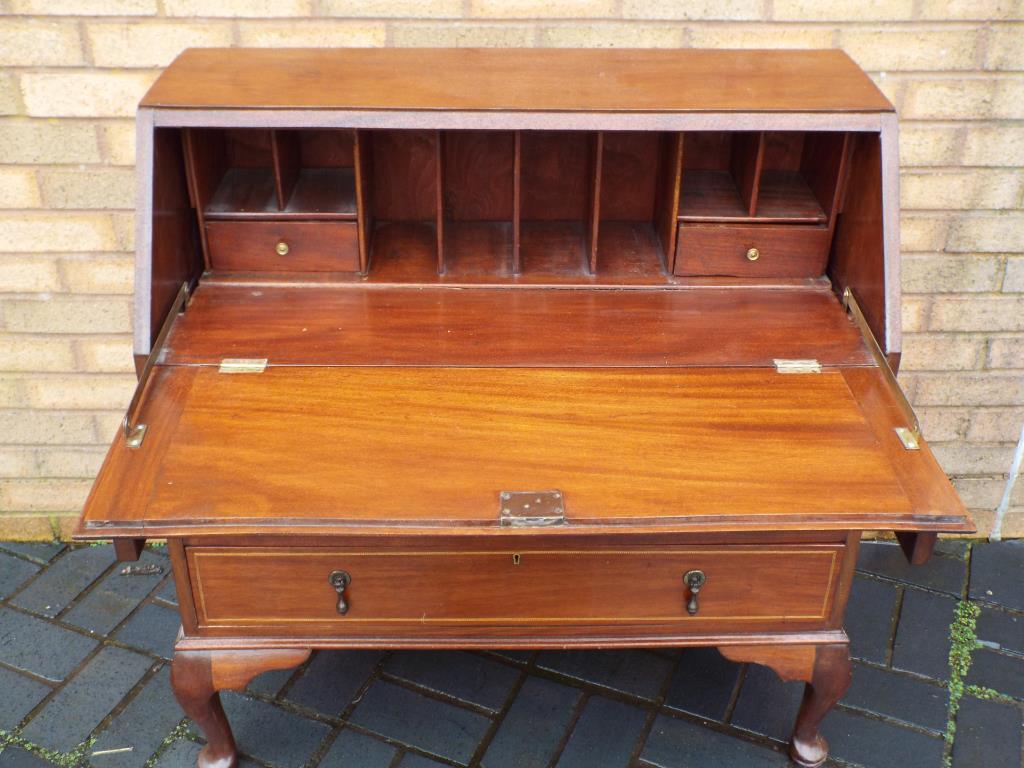 A mahogany bureau 97 cm (h) x 91 cm x 42 cm