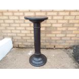 A good quality heavy plant stand in the form of a pillar,