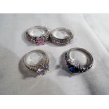 Four gold filled dress rings, stone set,