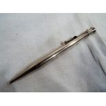 A sterling silver propelling pencil marked Onoto, 13.