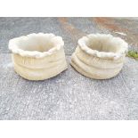 Stonework - a pair of reconstituted stone planters in the form of sacks