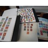 Philately - nine albums containing a good collection of mounted early 20th century and later UK and