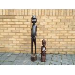 Two wooden African figures,