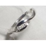 A lady's 9 carat white gold 10 pt diamond set five-stone ring, approx weight 1.