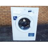 A Indesit digital washing machine with manuals model No.