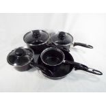 Unused retail stock - a 5-piece non-stick graphite pan set with stay cool handles,