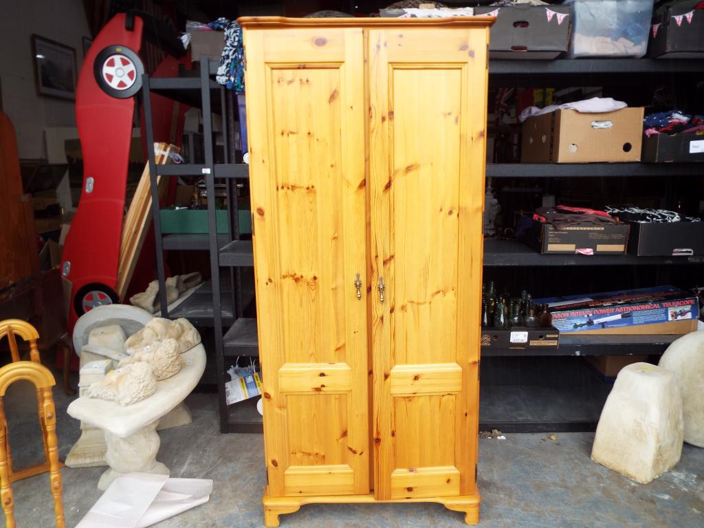 A pine wardrobe,