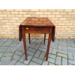 A small mahogony Pembroke Table with drawer on tapered legs - Est £40 - £60