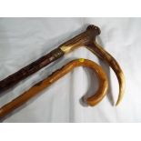 Two gentleman's walking sticks,