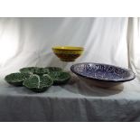 A collection of three ceramic bowls to include 1930s Crown Ducal pedestal bowl with floral