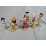 Beswick - a set of 7 Beswick Flintstone ceramic figurines.