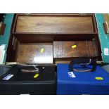 A wooden box containing display stands with a further small quantity of trinket boxes,