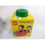 Lego - a storage brick one Lego container,
