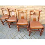 A set of four oak dining chairs with drop in seats (4)