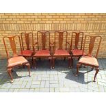 A set of two carvers and four dining chairs,
