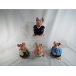 A collection of four ceramic Wade NatWest pig money boxes (lacking stoppers)