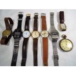 A job lot of gentleman's watches and timepieces to include a Swiss hallmarked 9 carat gold cased